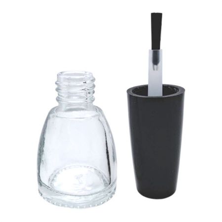kleine Glasflasche mit Deckel und Pinsel
